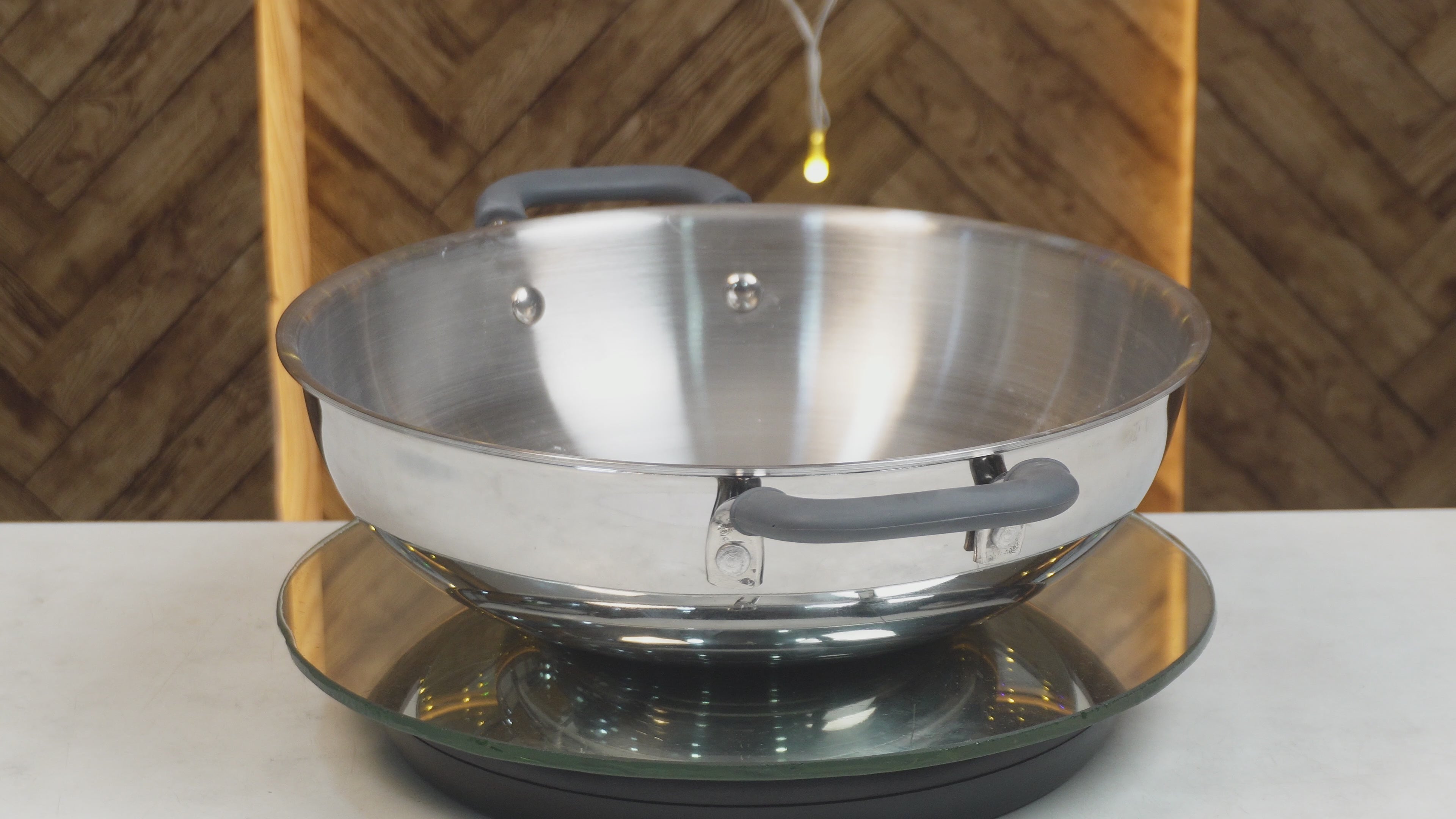 Load video: MM Triply Deep Kadai With Silicon Handle