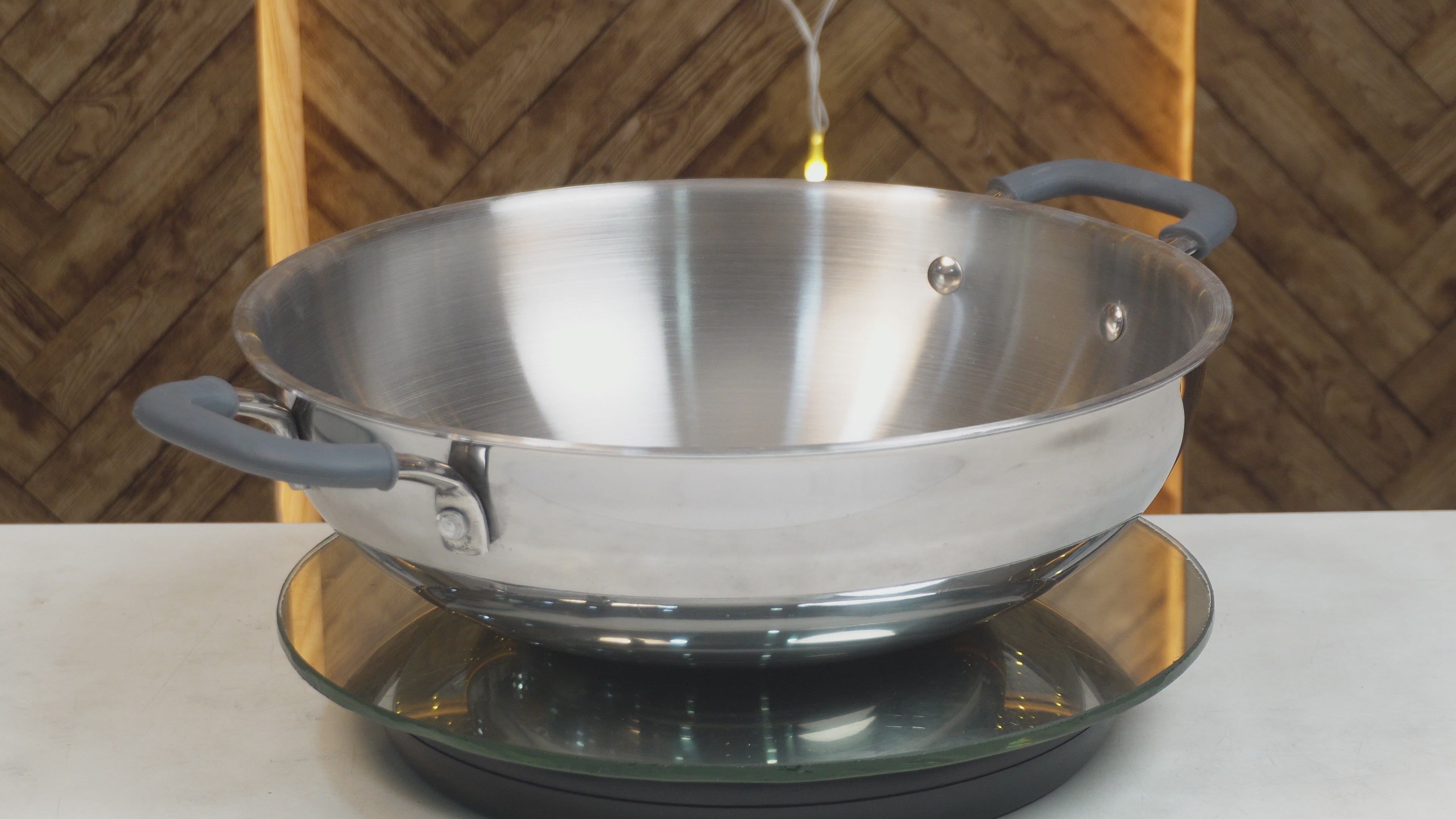 Load video: MM Triply Deep Kadai With Silicon Handle