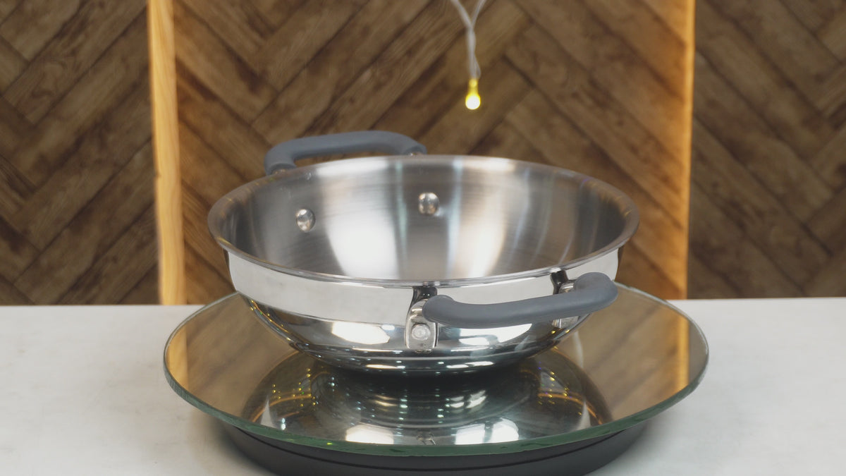 Load video: MM Triply Deep Kadai With Silicon Handle