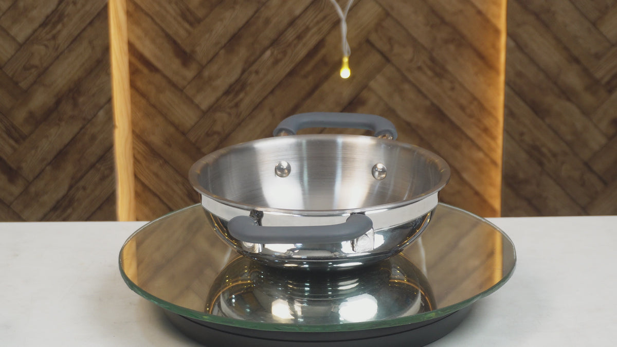 Load video: MM Triply Deep Kadai With Silicon Handle