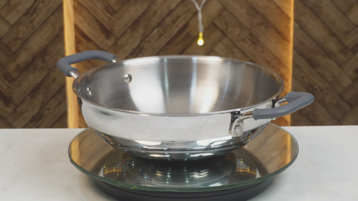 Load video: MM Triply Deep Kadai With Silicon Handle