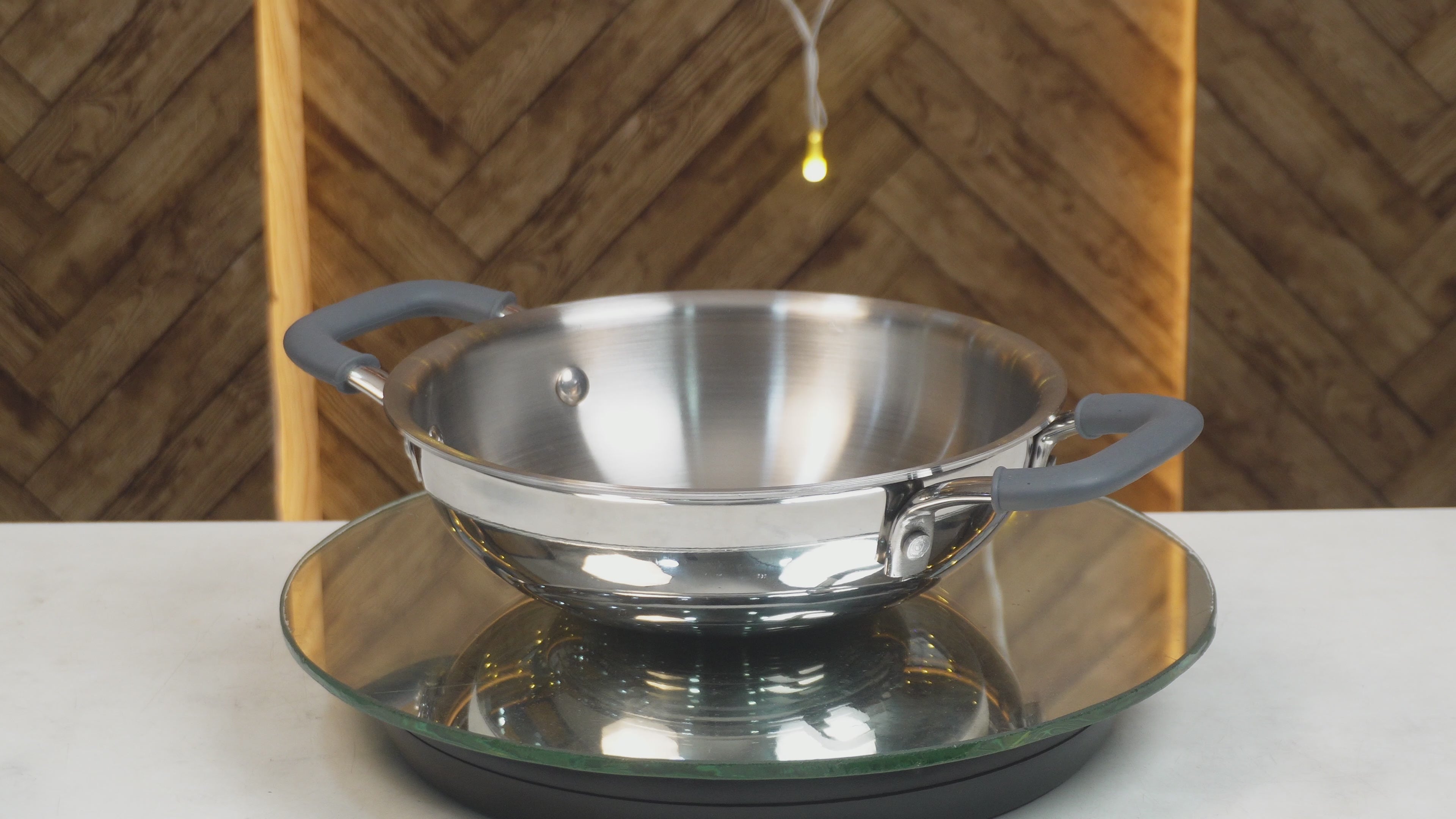 Load video: MM Triply Deep Kadai With Silicon Handle