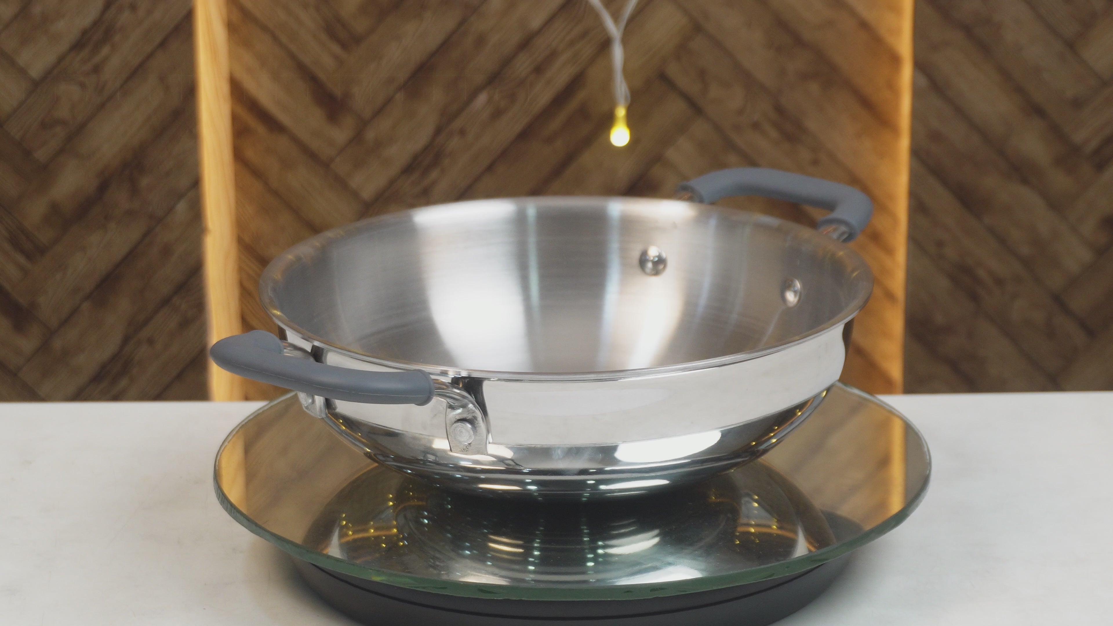 Load video: MM Triply Deep Kadai With Silicon Handle
